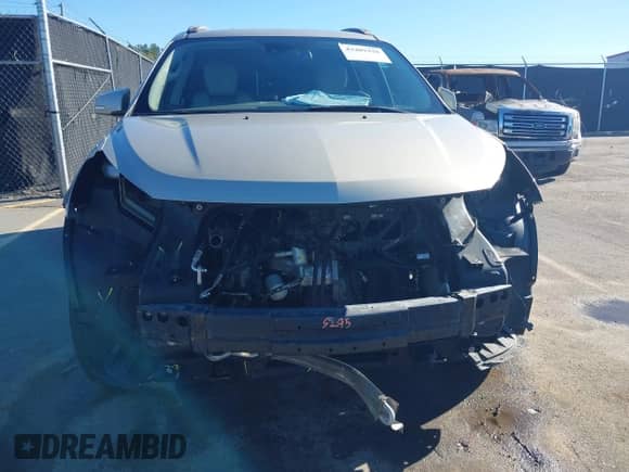 2014 Chevrolet Traverse LT z VIN 1GNKRHKD5EJ134069, wystawiony jako IAAI lot #43489428 z przebiegiem 151 134 mil mil oraz . Historia ofert i sprzedaży dostępna na DreamBid. Obrazek 6.