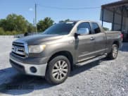 ✅ 2012 Toyota Tundra • VIN: 5TFRY5F10CX123032 • Lot: 72042745. Listed on Copart with 102,214 mi. Free auction sales archive from the USA and detailed vehicle history report at DreamBid. Image 1.