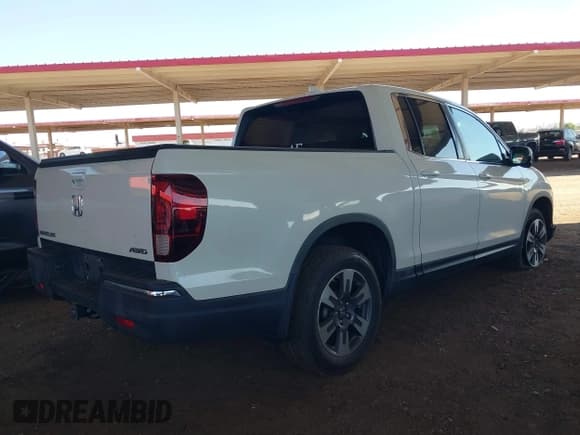 ✅ 2018 Honda Ridgeline RTL-T • VIN: 5FPYK3F6XJB007770 • Lot: 42849205. Listed on IAAI with 77,701 mi. Free auction sales archive from the USA and detailed vehicle history report at DreamBid. Image 4.