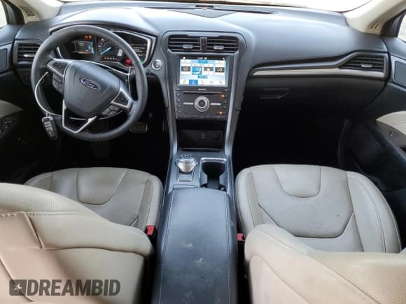 ✅ 2017 Ford Fusion Hybrid Titanium • VIN: 3FA6P0RUXHR234093 • Lot: 57997865. Wystawiony na Copart z przebiegiem 124 862 mil. Bezpłatny archiwum sprzedaży aukcyjnych z USA i szczegółowy raport historii pojazdu na DreamBid. Zdjęcie 8.