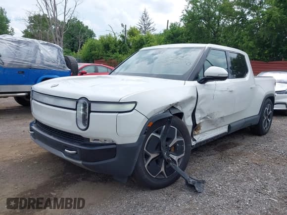 ✅ 2023 Rivian R1T Adventure • VIN: 7FCTGAAA5PN023786 • Lot: 42617396. Wystawiony na IAAI z przebiegiem 38 879 mil. Bezpłatny archiwum sprzedaży aukcyjnych z USA i szczegółowy raport historii pojazdu na DreamBid. Zdjęcie 2.
