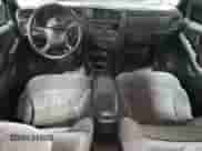 1999 Chevrolet Blazer LS with VIN 1GNDT13W9X2105768, listed as a Copart auction lot 80141174 with 193,804 mi miles and Salvage title. Bid and sale history available at DreamBid. Image 8.