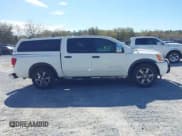 ✅ 2015 Nissan Titan SV • VIN: 1N6BA0ED5FN503033 • Lot: 41881909. Listed on IAAI with 151,432 mi. Free auction sales archive from the USA and detailed vehicle history report at DreamBid. Image 13.