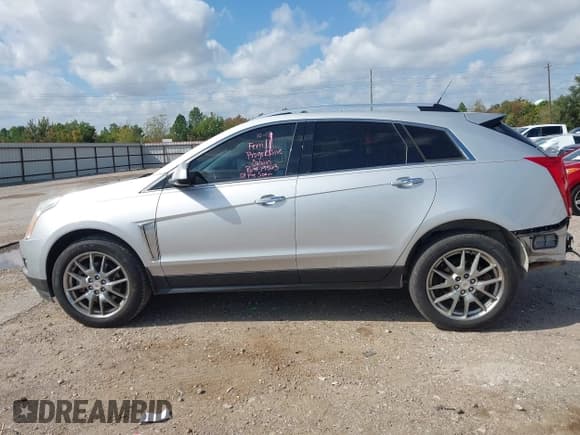 ✅ 2013 Cadillac SRX Performance Collection • VIN: 3GYFNDE30DS513053 • Lot: 43530295. Listed on IAAI with 124,178 mi. Free auction sales archive from the USA and detailed vehicle history report at DreamBid. Image 15.