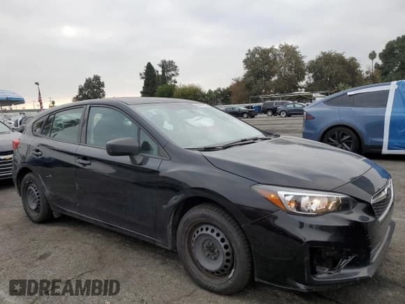 ✅ 2017 Subaru Impreza • VIN: 4S3GTAA61H3722795 • Lot: 90947505. Listed on Copart with 104,860 mi. Free auction sales archive from the USA and detailed vehicle history report at DreamBid. Image 4.