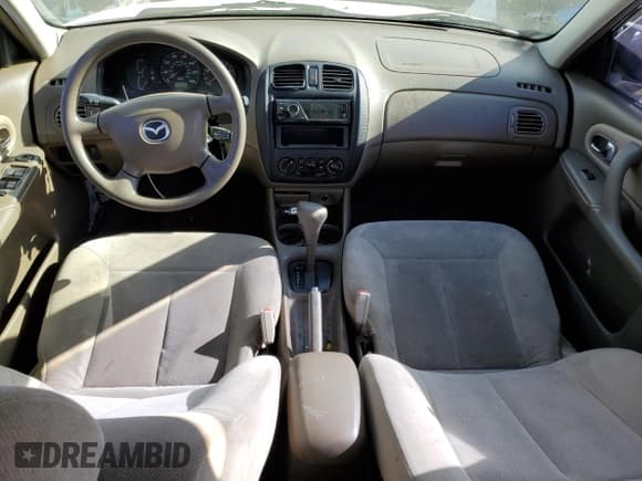 ✅ 2000 Mazda Protege DX • VIN: JM1BJ222XY0250079 • Lot: 77715474. Wystawiony na Copart z przebiegiem 139 214 mil. Bezpłatny archiwum sprzedaży aukcyjnych z USA i szczegółowy raport historii pojazdu na DreamBid. Zdjęcie 8.