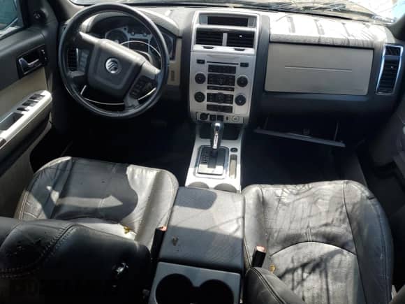 2009 Mercury Mariner Premier with VIN 4M2CU97789KJ24764, listed as a Copart auction lot 78209954 with 147,590 mi miles and Non repairable. Bid and sale history available at DreamBid. Image 8.