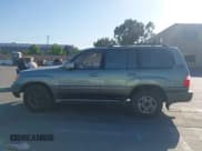 ✅ 2001 Lexus LX 470 • VIN: JTJHT00W113500583 • Lot: 42373922. Wystawiony na IAAI z przebiegiem 269 323 mil. Bezpłatny archiwum sprzedaży aukcyjnych z USA i szczegółowy raport historii pojazdu na DreamBid. Zdjęcie 14.