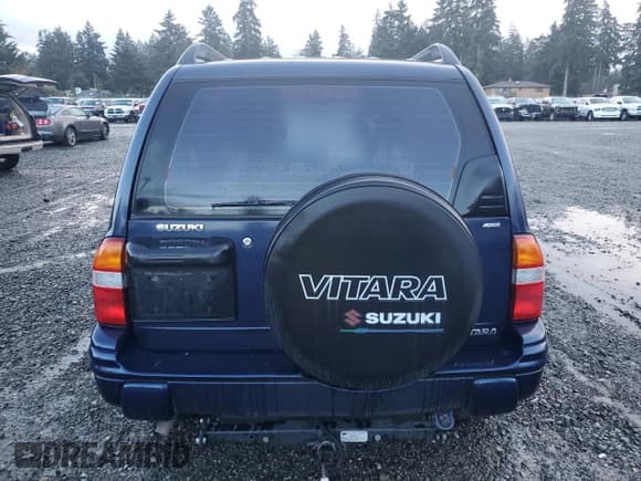 ✅ 2001 Suzuki Vitara JX • VIN: 2S3TD52V916109753 • Лот: 41543965. Опубликован ранее на Copart с пробегом 102 720 миль. Бесплатный доступ к архиву аукционных продаж из США и подробный отчёт об истории автомобиля на DreamBid. Изображение 6.