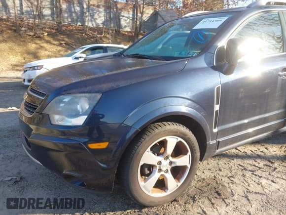 ✅ 2015 Chevrolet Captiva Sport LT • VIN: 3GNAL3EK2FS517557 • Lot: 41714309. Wystawiony na IAAI z przebiegiem 113 741 mil. Bezpłatny archiwum sprzedaży aukcyjnych z USA i szczegółowy raport historii pojazdu na DreamBid. Zdjęcie 13.
