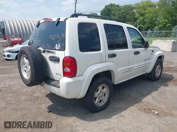 ✅ 2002 Jeep Liberty Limited • VIN: 1J8GL58K22W302844 • Lot: 42501721. Listed on IAAI with 133,078 mi. Free auction sales archive from the USA and detailed vehicle history report at DreamBid. Image 4.