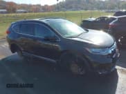 ✅ 2018 Honda CR-V Touring • VIN: 7FARW2H90JE052921 • Lot: 43671364. Listed on IAAI with 101,261 mi. Free auction sales archive from the USA and detailed vehicle history report at DreamBid. Image 1.