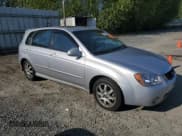 ✅ 2005 Kia Spectra • VIN: KNAFE161355121968 • Lot: 54621465. Listed on Copart with 221,951 mi. Free auction sales archive from the USA and detailed vehicle history report at DreamBid. Image 4.