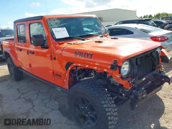 ✅ 2023 Jeep Gladiator Willys • VIN: 1C6HJTAG5PL589947 • Лот: 43263399. Опубликован ранее на IAAI с пробегом 12 549 миль. Бесплатный доступ к архиву аукционных продаж из США и подробный отчёт об истории автомобиля на DreamBid. Изображение 1.