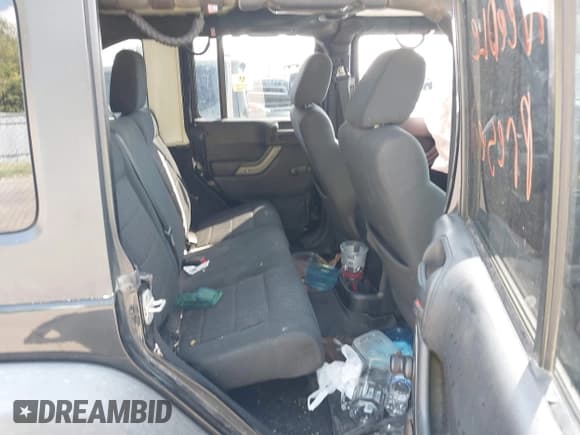 ✅ 2012 Jeep Wrangler Unlimited Sport • VIN: 1C4BJWDG2CL201563 • Lot: 43083863. Listed on IAAI with Not provided. Free auction sales archive from the USA and detailed vehicle history report at DreamBid. Image 8.