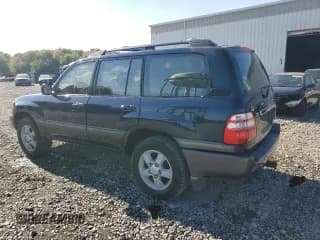 ✅ 2003 Toyota Land Cruiser • VIN: JTEHT05J232044467 • Лот: 81498385. Опубликован ранее на Copart с пробегом 214 236 миль. Бесплатный доступ к архиву аукционных продаж из США и подробный отчёт об истории автомобиля на DreamBid. Изображение 2.
