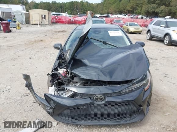✅ 2021 Toyota Corolla LE • VIN: JTDEPMAE7MJ127492 • Lot: 43417558. Listed on IAAI with 39,884 mi. Free auction sales archive from the USA and detailed vehicle history report at DreamBid. Image 12.