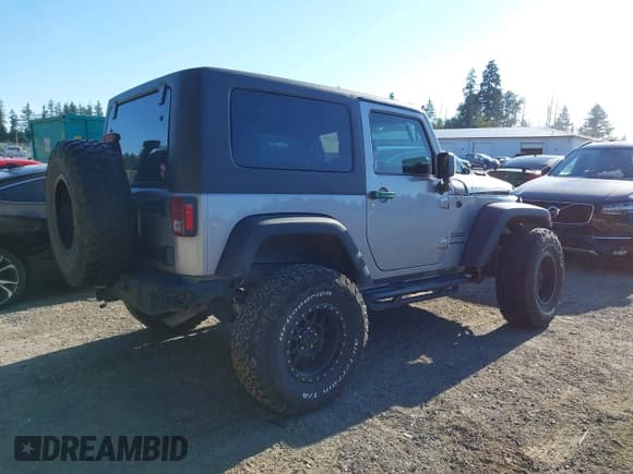 ✅ 2018 Jeep Wrangler Sport S • VIN: 1C4GJWAGXJL923886 • Lot: 42712359. Listed on IAAI with 68,234 mi. Free auction sales archive from the USA and detailed vehicle history report at DreamBid. Image 4.