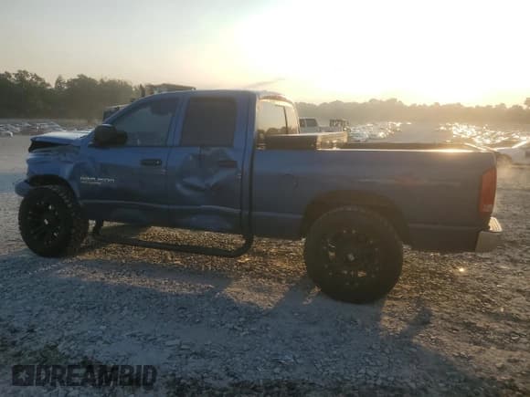 ✅ 2006 Dodge 1500 SLT • VIN: 1D7HU18N06S566997 • Lot: 80833855. Listed on Copart with 246,376 mi. Free auction sales archive from the USA and detailed vehicle history report at DreamBid. Image 2.