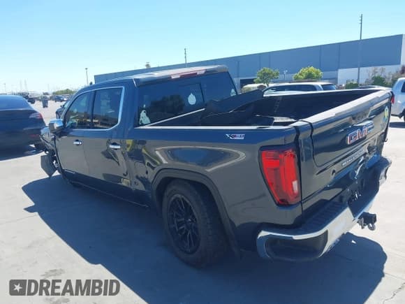 ✅ 2022 GMC Sierra 1500 SLT • VIN: 1GTU9DELONZ219903 • Lot: 40140320. Listed on IAAI with 57,019 mi. Free auction sales archive from the USA and detailed vehicle history report at DreamBid. Image 3.