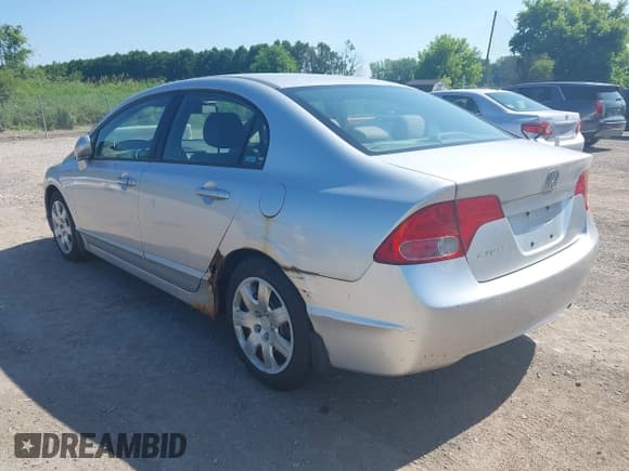 ✅ 2006 Honda Civic LX • VIN: 2HGFA16516H508404 • Lot: 42630879. Listed on IAAI with 157,013 mi. Free auction sales archive from the USA and detailed vehicle history report at DreamBid. Image 3.