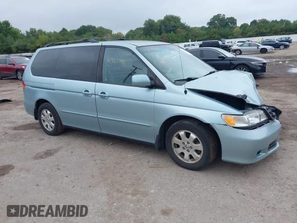 ✅ 2002 Honda Odyssey EX • VIN: 2HKRL18662H587193 • Lot: 43293042. Listed on IAAI with 126,663 mi. Free auction sales archive from the USA and detailed vehicle history report at DreamBid. Image 1.