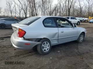 2005 Hyundai Accent GLS with VIN KMHCG35C05U343447, listed as a Copart auction lot 50418275 with 145,843 mi miles and Salvage title. Bid and sale history available at DreamBid. Image 3.