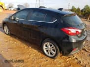 ✅ 2018 Chevrolet Cruze LT • VIN: 3G1BE6SM9JS649490 • Lot: 70677352. Listed on Copart with 56,923 mi. Free auction sales archive from the USA and detailed vehicle history report at DreamBid. Image 2.