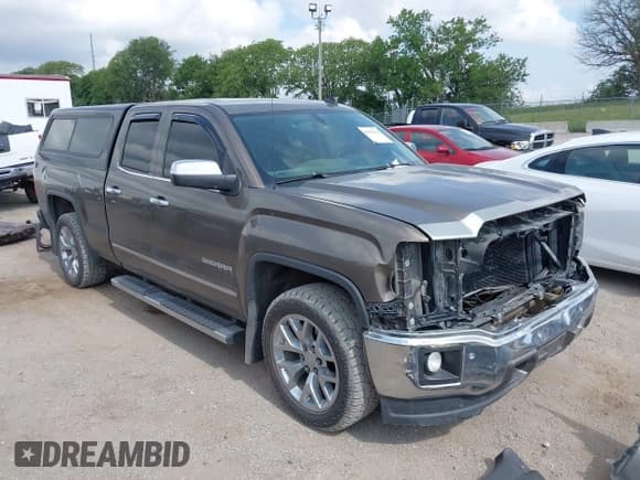 ✅ 2014 GMC Sierra 1500 SLT • VIN: 1GTR1VEC1EZ133972 • Lot: 42502436. Listed on IAAI with 149,731 mi. Free auction sales archive from the USA and detailed vehicle history report at DreamBid. Image 1.