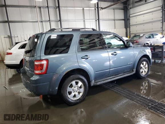 ✅ 2012 Ford Escape Hybrid • VIN: 1FMCU5K33CKB39548 • Lot: 65647465. Wystawiony na Copart z przebiegiem 126 217 mil. Bezpłatny archiwum sprzedaży aukcyjnych z USA i szczegółowy raport historii pojazdu na DreamBid. Zdjęcie 3.