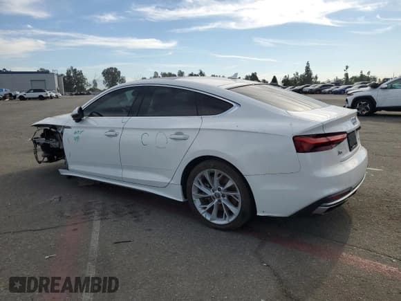 ✅ 2020 Audi A5 Sportback Premium • VIN: WAUANCF57LA005024 • Lot: 87266845. Listed on Copart with 69,104 mi. Free auction sales archive from the USA and detailed vehicle history report at DreamBid. Image 2.