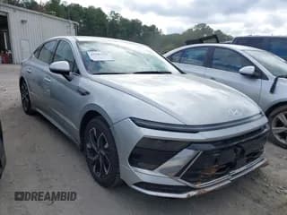 ✅ 2025 Hyundai Sonata SEL • VIN: KMHL64JA4SA485620 • Лот: 43387929. Опубликован ранее на IAAI с пробегом 14 958 миль. Бесплатный доступ к архиву аукционных продаж из США и подробный отчёт об истории автомобиля на DreamBid. Изображение 1.