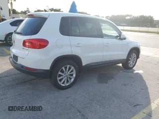 ✅ 2014 Volkswagen Tiguan S • VIN: WVGAV3AXXEW525487 • Lot: 43786959. Listed on IAAI with 110,414 mi. Free auction sales archive from the USA and detailed vehicle history report at DreamBid. Image 4.