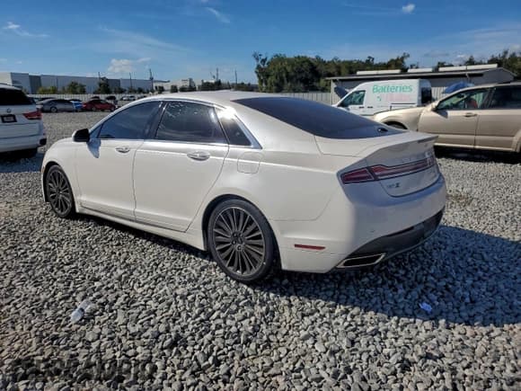 ✅ 2015 Lincoln MKZ Hybrid • VIN: 3LN6L2LU1FR628441 • Lot: 94491825. Listed on Copart with 210,716 mi. Free auction sales archive from the USA and detailed vehicle history report at DreamBid. Image 2.