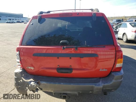 ✅ 2000 Jeep Grand Cherokee Laredo • VIN: 1J4GW48S1YC214915 • Lot: 82728995. Listed on Copart with 111,305 mi. Free auction sales archive from the USA and detailed vehicle history report at DreamBid. Image 6.