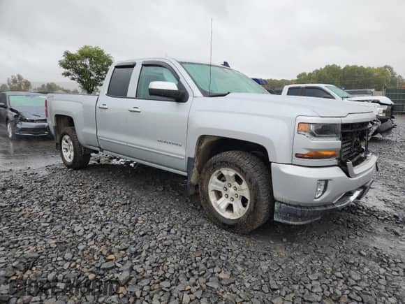 2017 Chevrolet Silverado 1500 LT with VIN 1GCVKREC4HZ326298, listed as a Copart auction lot 85676485 with 104,042 mi miles and Salvage title. Bid and sale history available at DreamBid. Image 4.