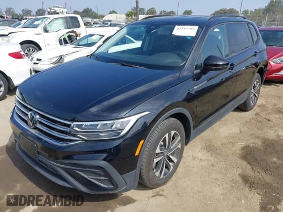 ✅ 2024 Volkswagen Tiguan S • VIN: 3VVRB7AX0RM055422 • Lot: 42344755. Listed on IAAI with 20,670 mi. Free auction sales archive from the USA and detailed vehicle history report at DreamBid. Image 2.