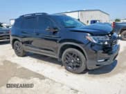 ✅ 2024 Honda Passport Black Edition • VIN: 5FNYF8H86RB002604 • Lot: 58368835. Listed on Copart with 14,145 mi. Free auction sales archive from the USA and detailed vehicle history report at DreamBid. Image 4.