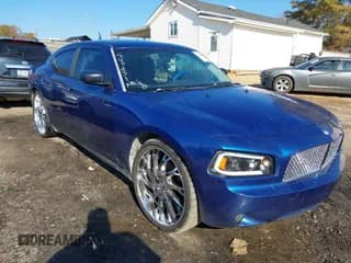 ✅ 2009 Dodge Charger SXT • VIN: 2B3KA33V29H560451 • Lot: 43728069. Listed on IAAI with 207,260 mi. Free auction sales archive from the USA and detailed vehicle history report at DreamBid. Image 1.