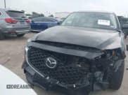 ✅ 2023 Mazda CX-5 S Carbon Edition • VIN: JM3KFBCM8P0202054 • Lot: 42392586. Listed on IAAI with 50,944 mi. Free auction sales archive from the USA and detailed vehicle history report at DreamBid. Image 12.