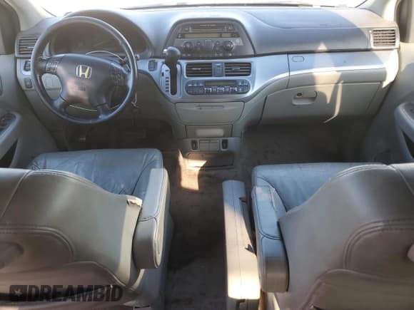 ✅ 2009 Honda Odyssey EX-L • VIN: 5FNRL38609B022992 • Lot: 90474065. Listed on Copart with 106,975 mi. Free auction sales archive from the USA and detailed vehicle history report at DreamBid. Image 8.