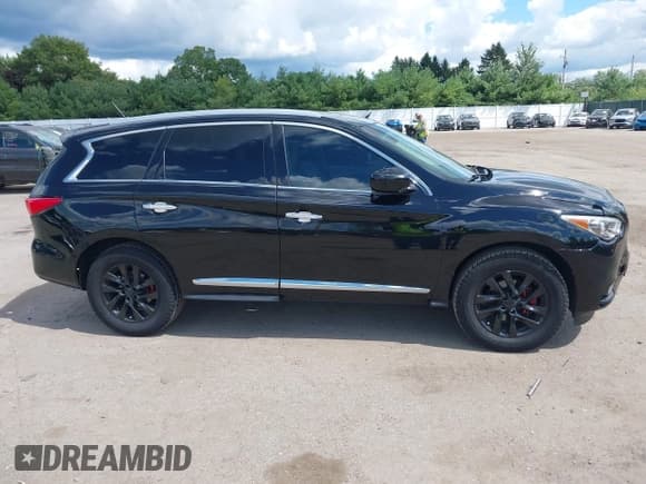 ✅ 2015 Infiniti QX60 • VIN: 5N1AL0MMXFC549958 • Lot: 43083713. Listed on IAAI with 112,051 mi. Free auction sales archive from the USA and detailed vehicle history report at DreamBid. Image 13.