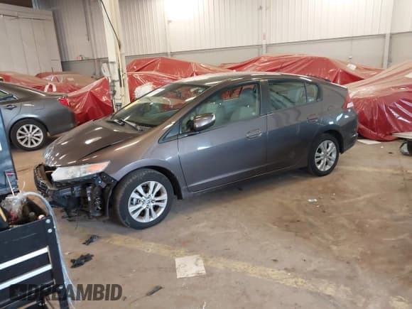 ✅ 2012 Honda Insight EX • VIN: JHMZE2H76CS003773 • Lot: 41926342. Listed on IAAI with 73,459 mi. Free auction sales archive from the USA and detailed vehicle history report at DreamBid. Image 2.