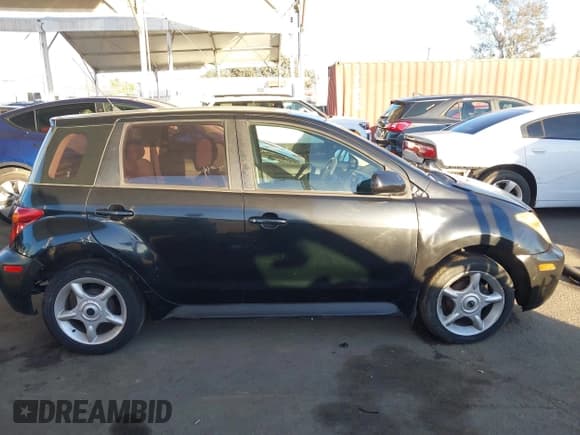 ✅ 2005 Scion xA • VIN: JTKKT624650117519 • Lot: 43642483. Listed on IAAI with 200,619 mi. Free auction sales archive from the USA and detailed vehicle history report at DreamBid. Image 13.