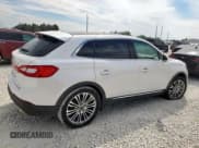 ✅ 2016 Lincoln MKX Reserve • VIN: 2LMPJ6LR6GBL63453 • Lot: 84600455. Listed on Copart with 30,646 mi. Free auction sales archive from the USA and detailed vehicle history report at DreamBid. Image 3.