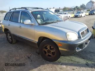 ✅ 2002 Hyundai Santa Fe GLS • VIN: KM8SC73D32U156614 • Lot: 43868952. Listed on IAAI with 129,623 mi. Free auction sales archive from the USA and detailed vehicle history report at DreamBid. Image 1.