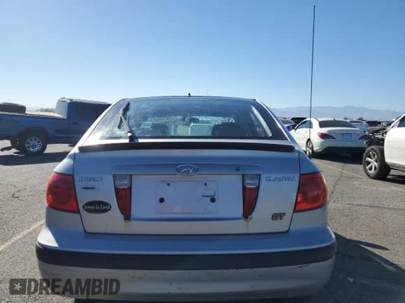 2003 Hyundai Elantra GT z VIN KMHDN55D23U097111, wystawiony jako Copart lot #79975994 z przebiegiem 111 716 mil mil oraz Czysty tytuł • Clean title. Historia ofert i sprzedaży dostępna na DreamBid. Obrazek 6.