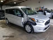 ✅ 2022 Ford Transit Connect XLT • VIN: NM0GE9F25N1515717 • Lot: 57802005. Listed on Copart with 59,951 mi. Free auction sales archive from the USA and detailed vehicle history report at DreamBid. Image 4.