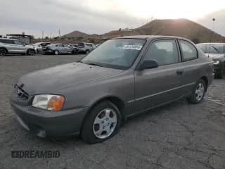 ✅ 2001 Hyundai Accent GS • VIN: KMHCG35C81U141661 • Лот: 84124804. Опубликован ранее на Copart с пробегом 38 318 миль. Бесплатный доступ к архиву аукционных продаж из США и подробный отчёт об истории автомобиля на DreamBid. Изображение 1.