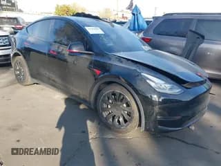 ✅ 2022 Tesla Model Y Long Range • VIN: 7SAYGDEE0NF351433 • Lot: 43582029. Listed on IAAI with 69,170 mi. Free auction sales archive from the USA and detailed vehicle history report at DreamBid. Image 1.